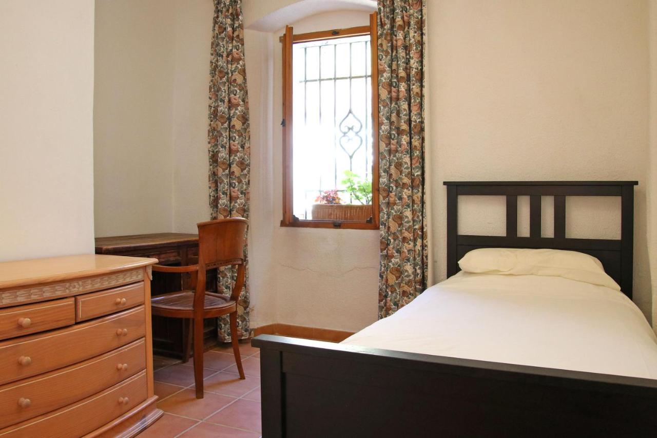 Habitación Individual con ducha y aseo compartidos