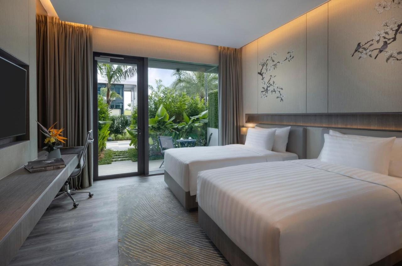 Quarto Deluxe Laguna com 2 Camas de Solteiro, Varanda Térrea e Vista da Piscina