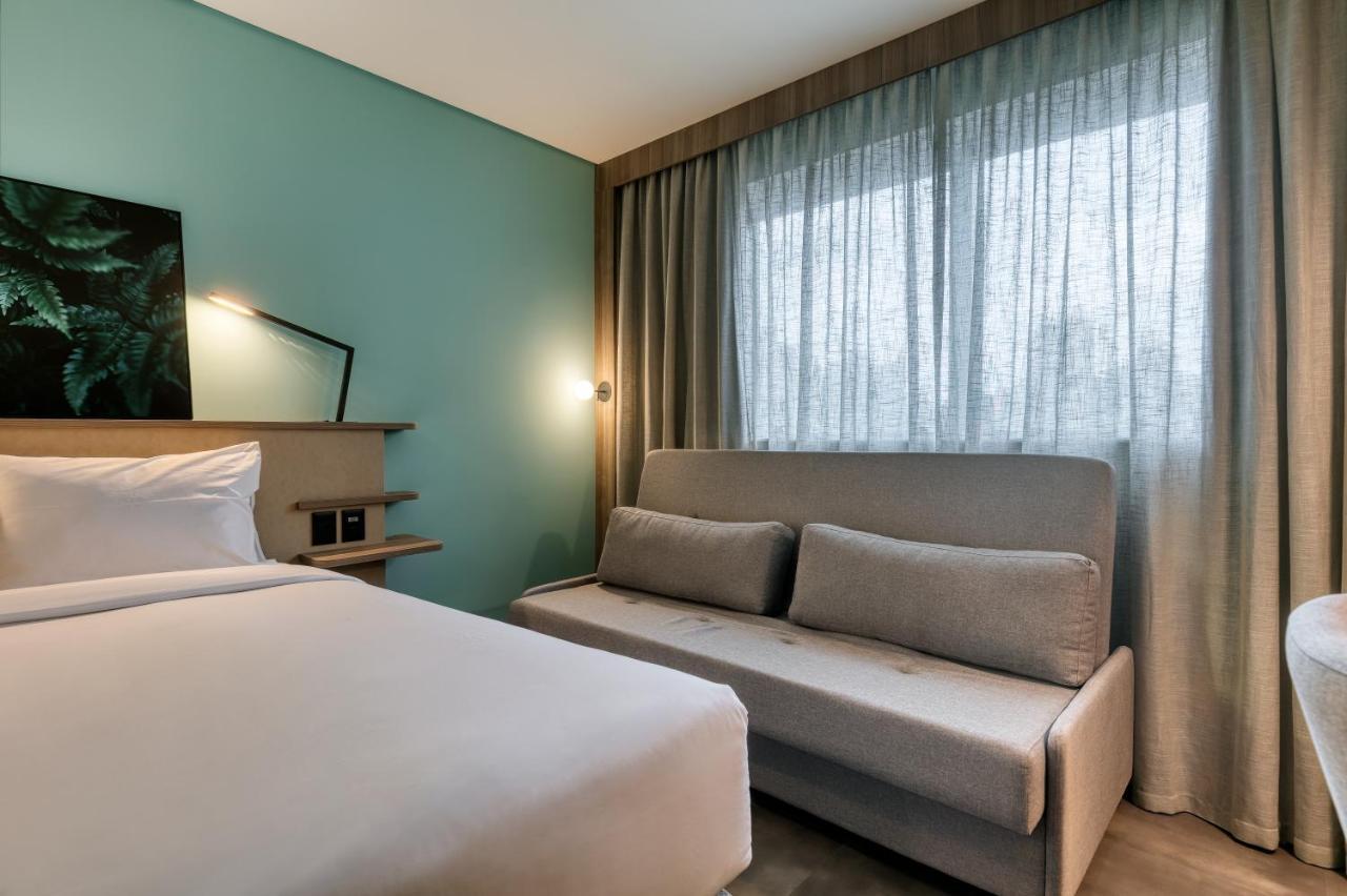 Quarto Queen Superior com Sofá-cama