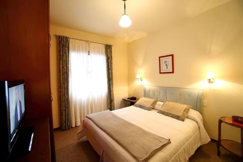 Quarto Duplo