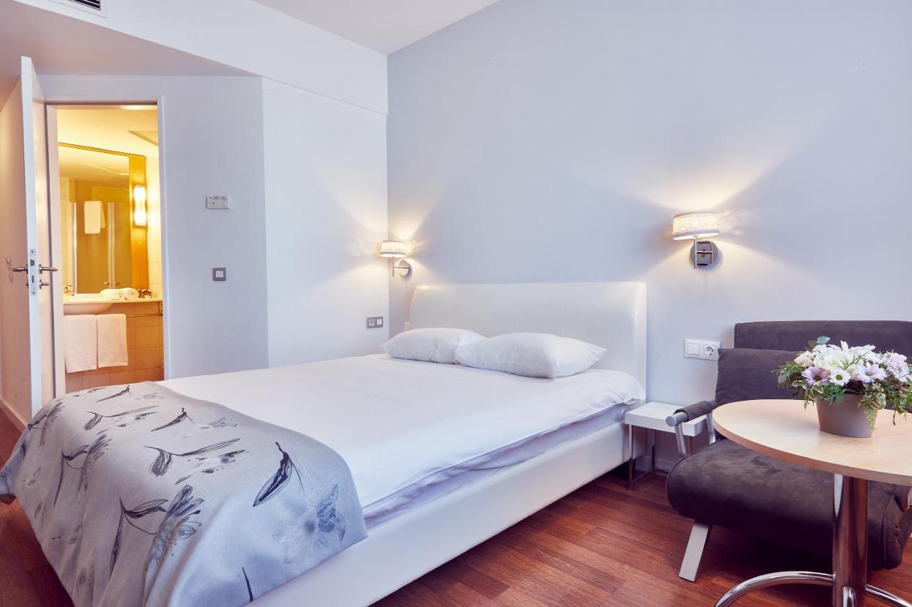 Superior Double Room with extendable armchair,1169769706:JPEG