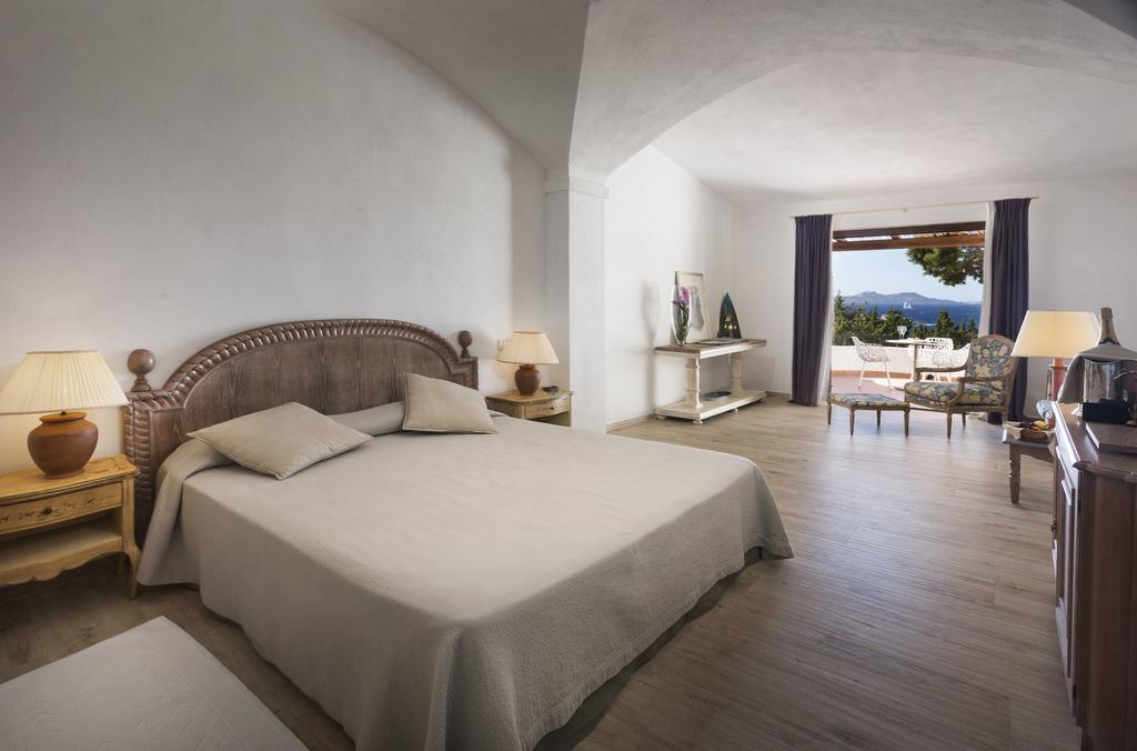 Kamer met Queensize Bed en Uitzicht op Zee