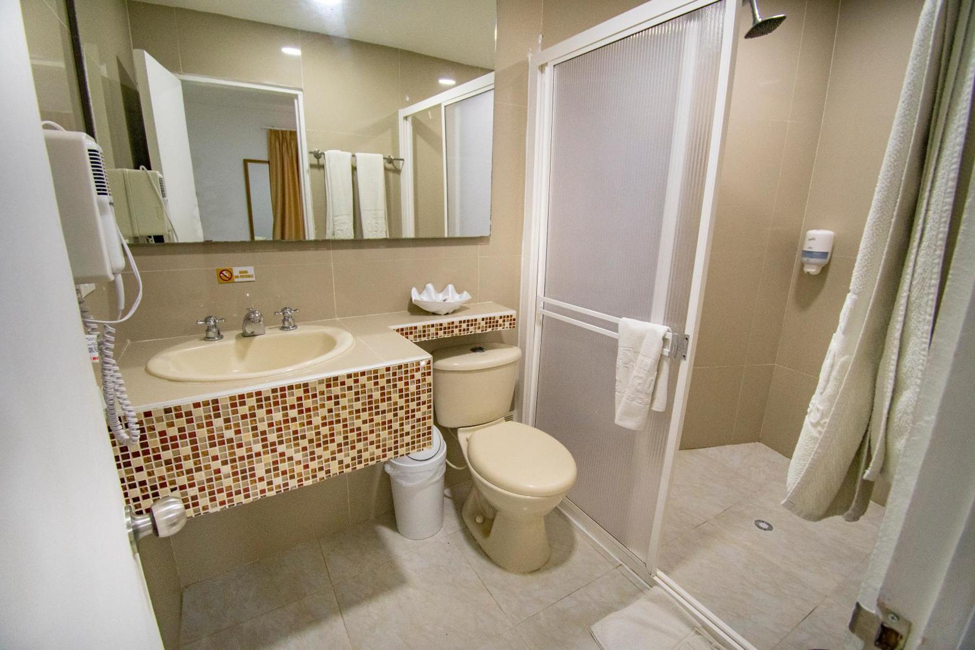 Quarto Triplo Standard com Vista para o Jardim