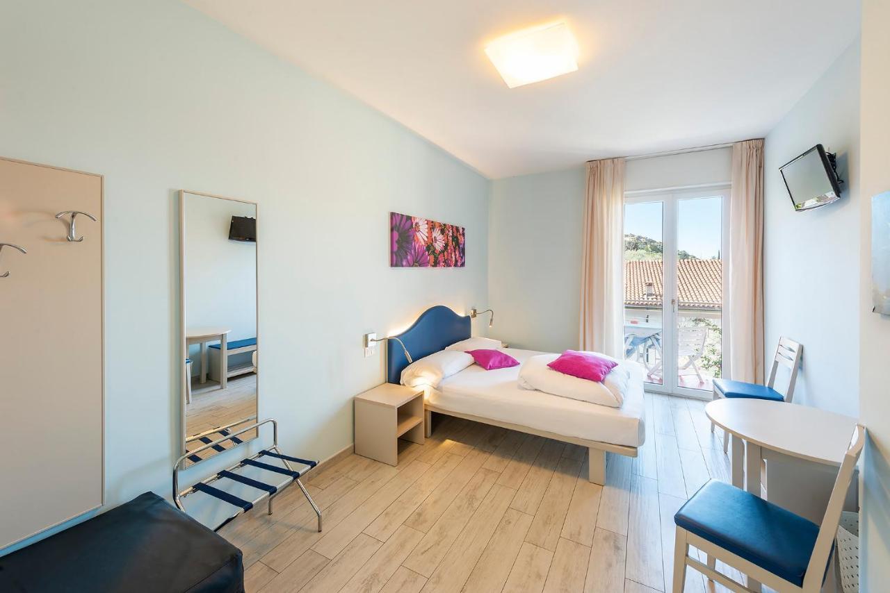 Standard Triple Room Balcony Partial Lake View