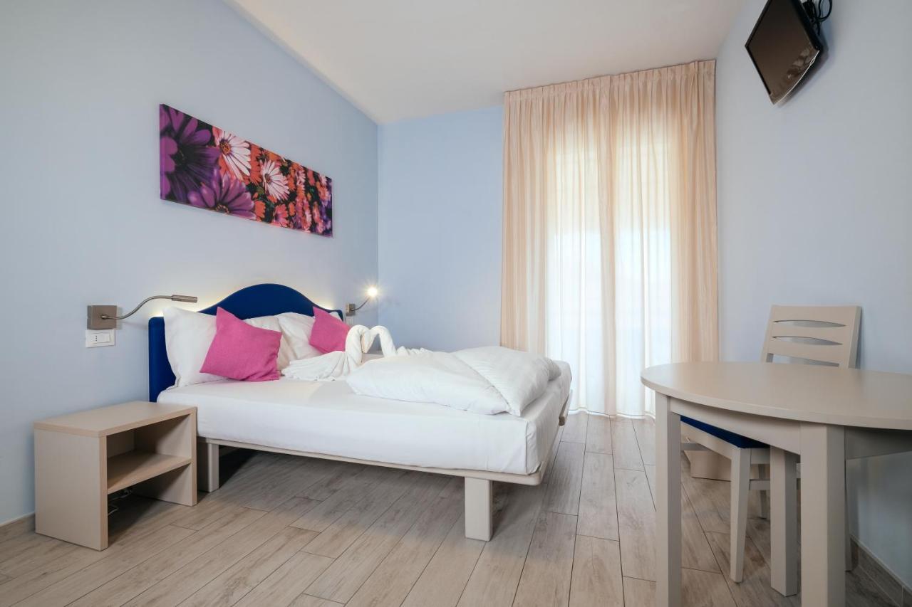 Standard Triple Room Balcony Partial Lake View
