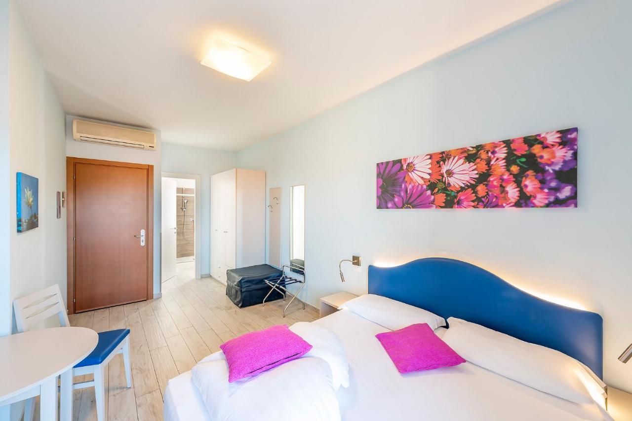 Standard Triple Room Balcony Partial Lake View