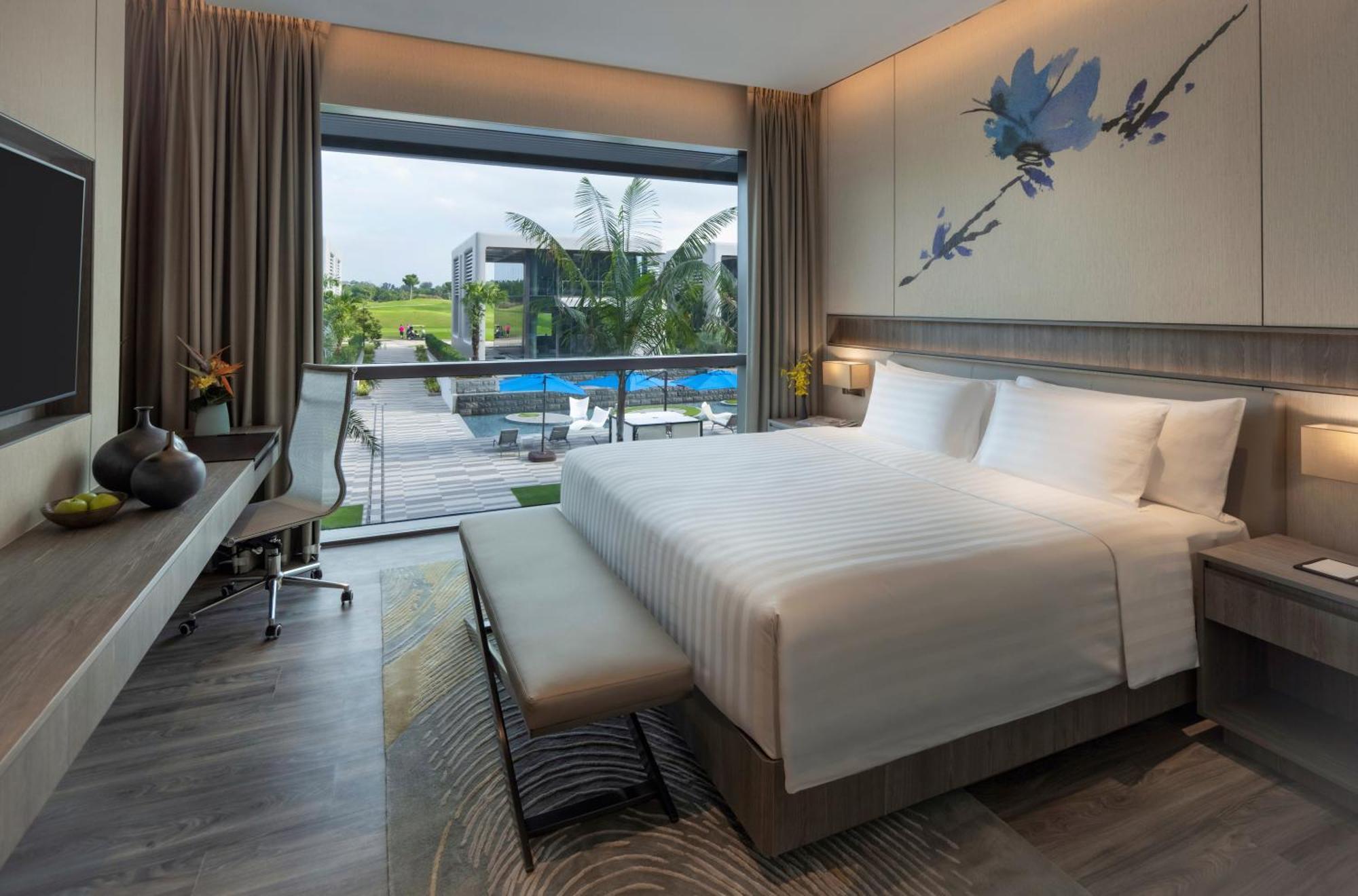 Acomodação Executiva Dusit com Cama King-size e Vista da Piscina