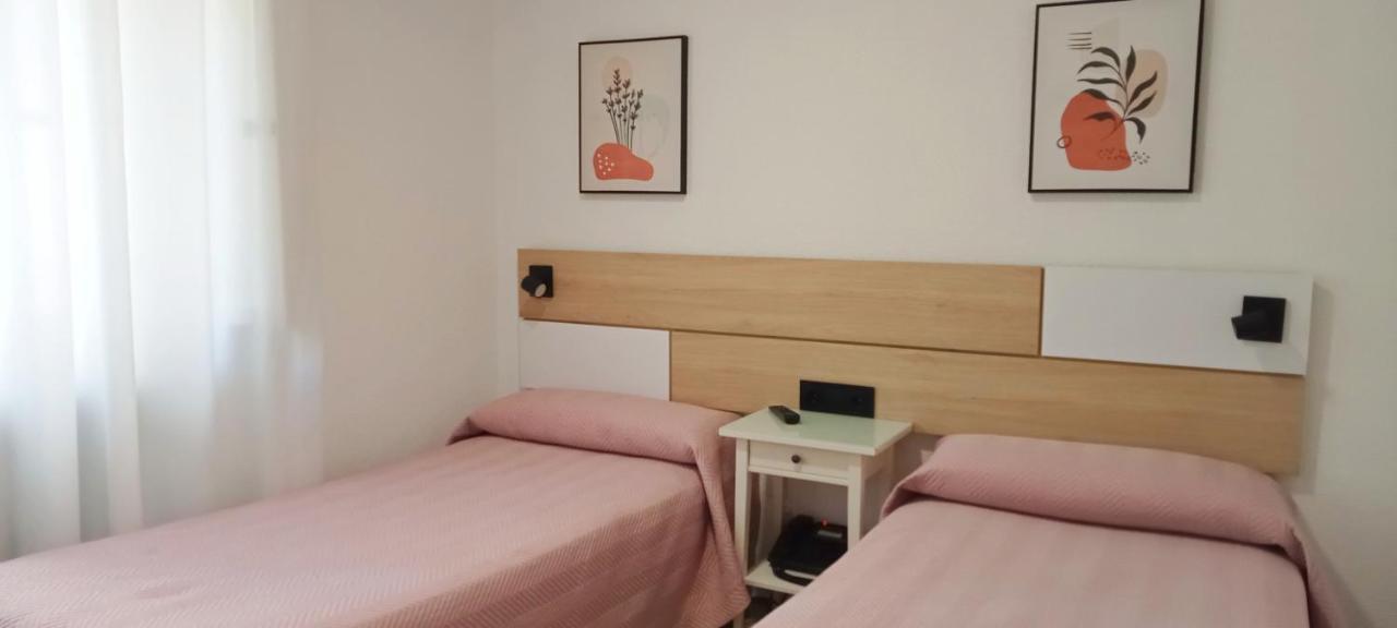 Tweepersoonskamer met 2 Aparte Bedden