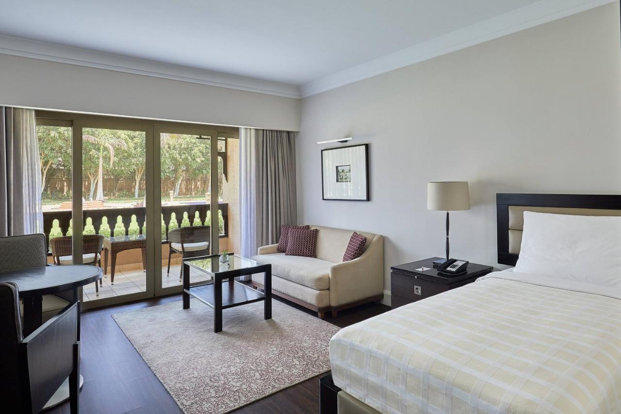 Habitación Deluxe con cama extragrande, balcón y vistas al jardín