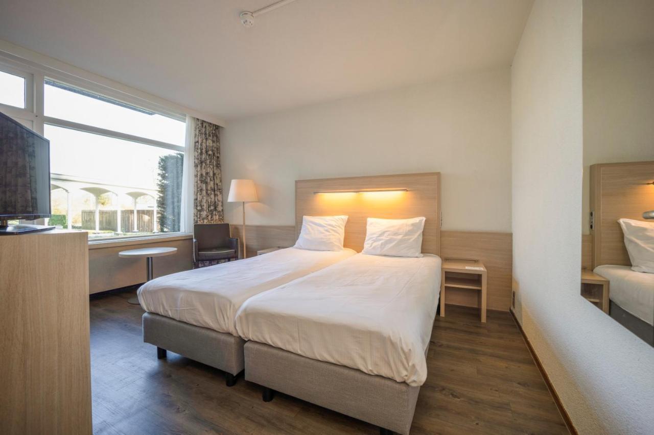 Standaard Tweepersoonskamer met 1 of 2 Bedden en Balkon