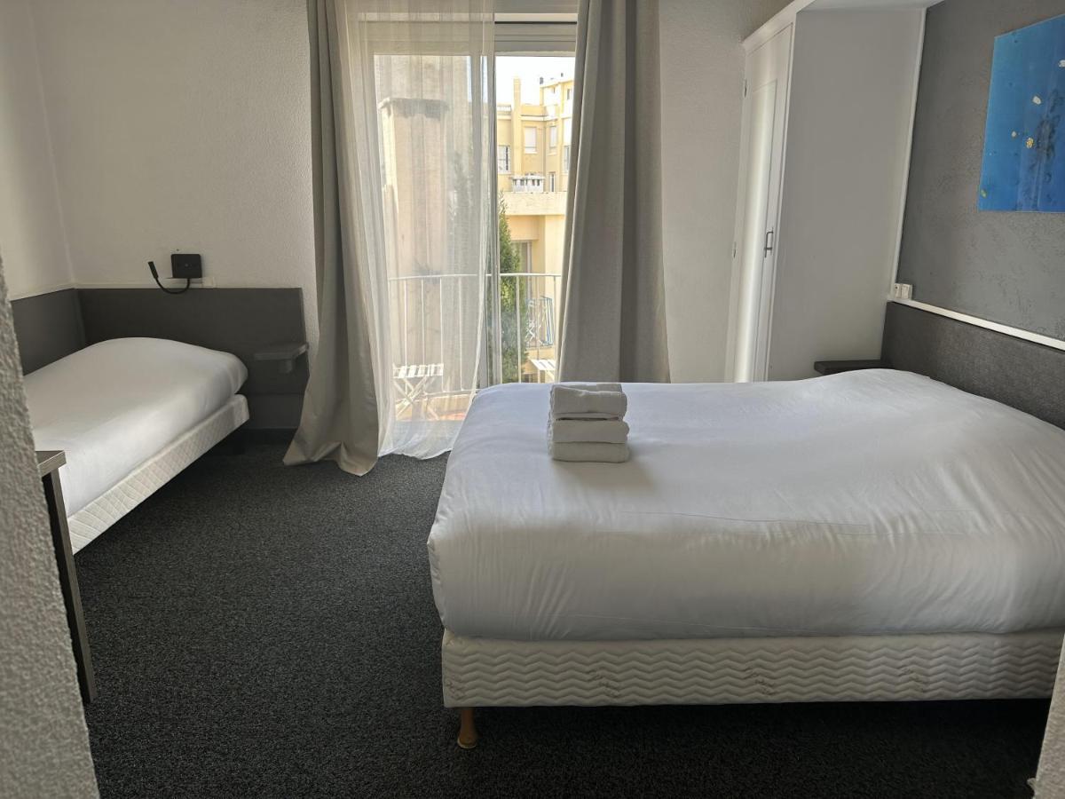 Chambre Triple avec Balcon - 2e Étage