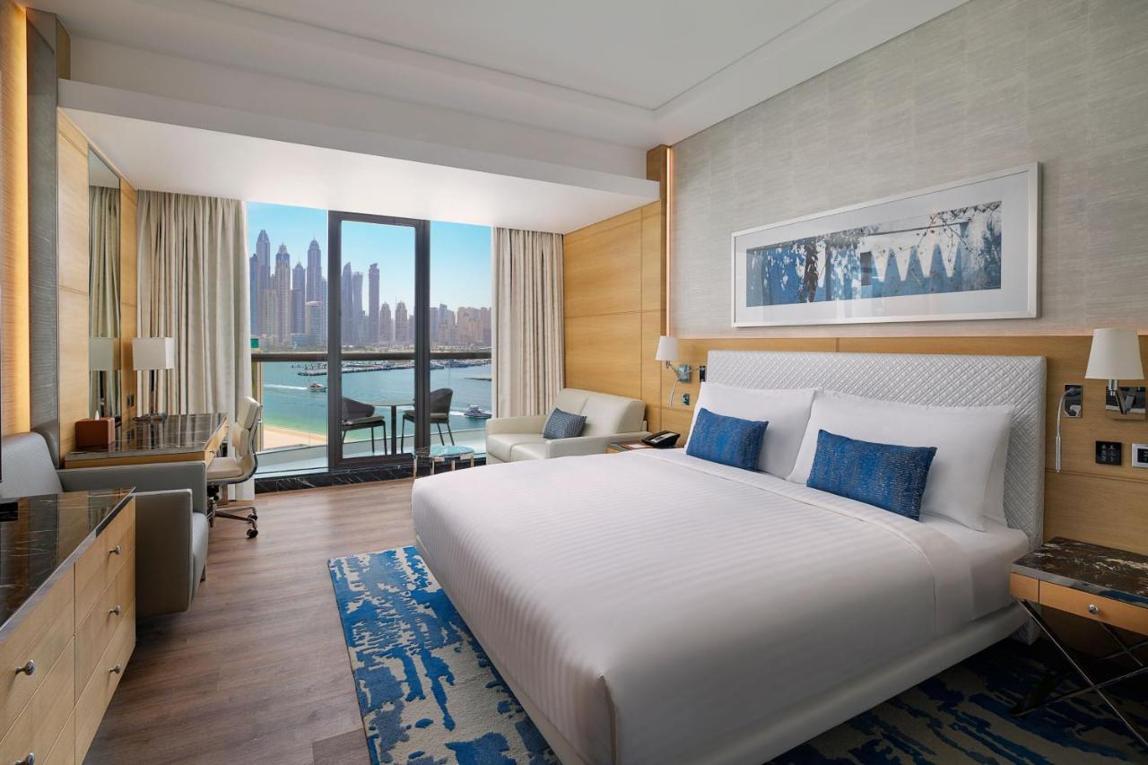 Grand Deluxe Room 1 King Bed Sofa Bed Partial Sea View Private Balcony Beachfront Resort