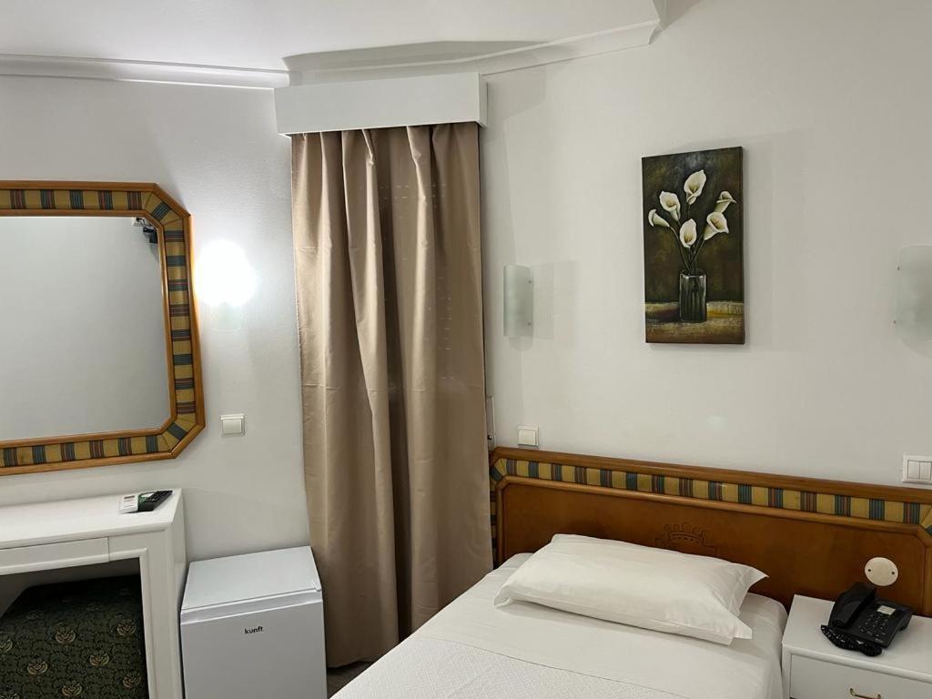 Quarto Individual com Casa de Banho Privativa