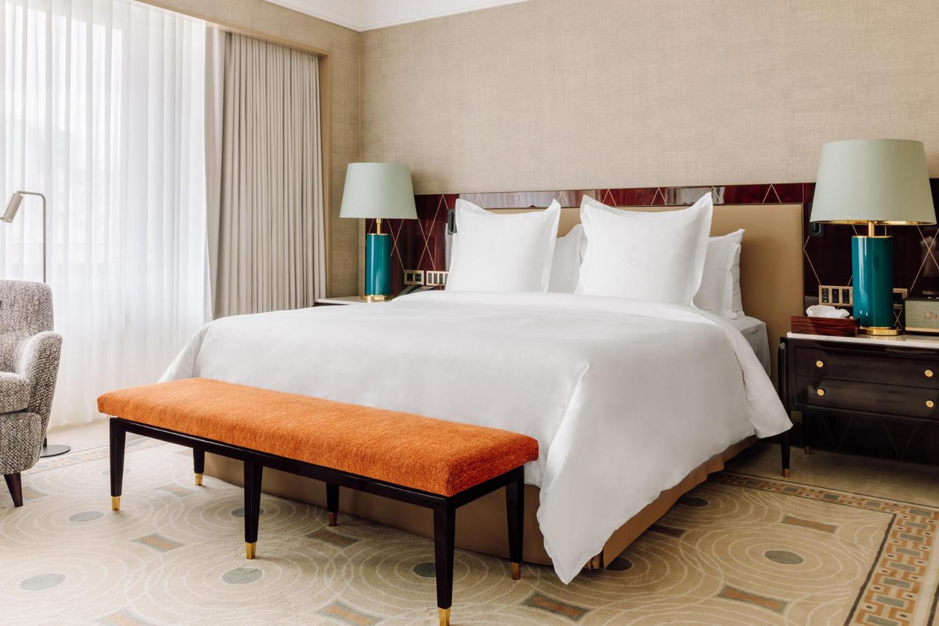 Quarto Superior com Cama King-size.