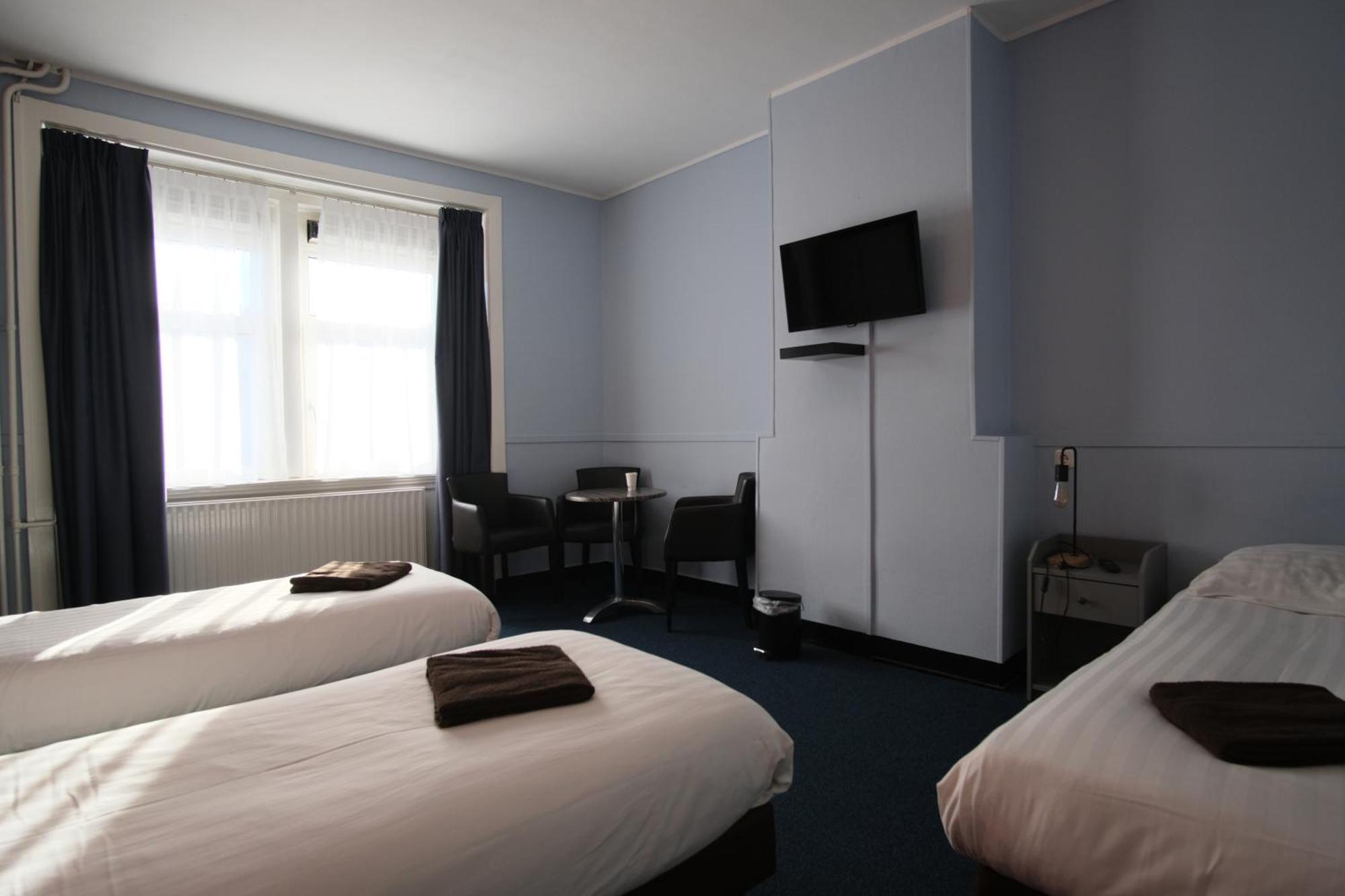 Chambre Triple avec Salle de Bains Commune