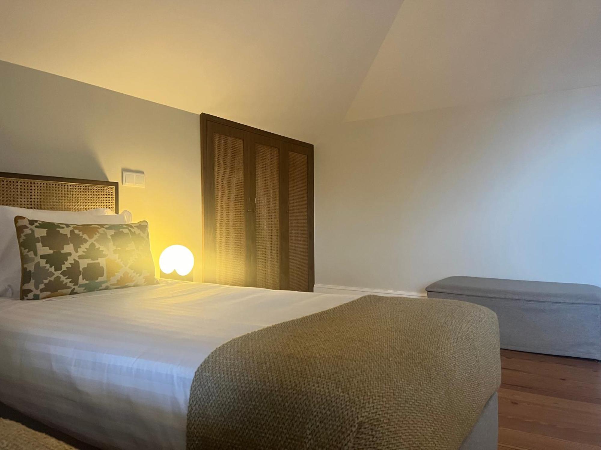 Cama individual en habitación compartida