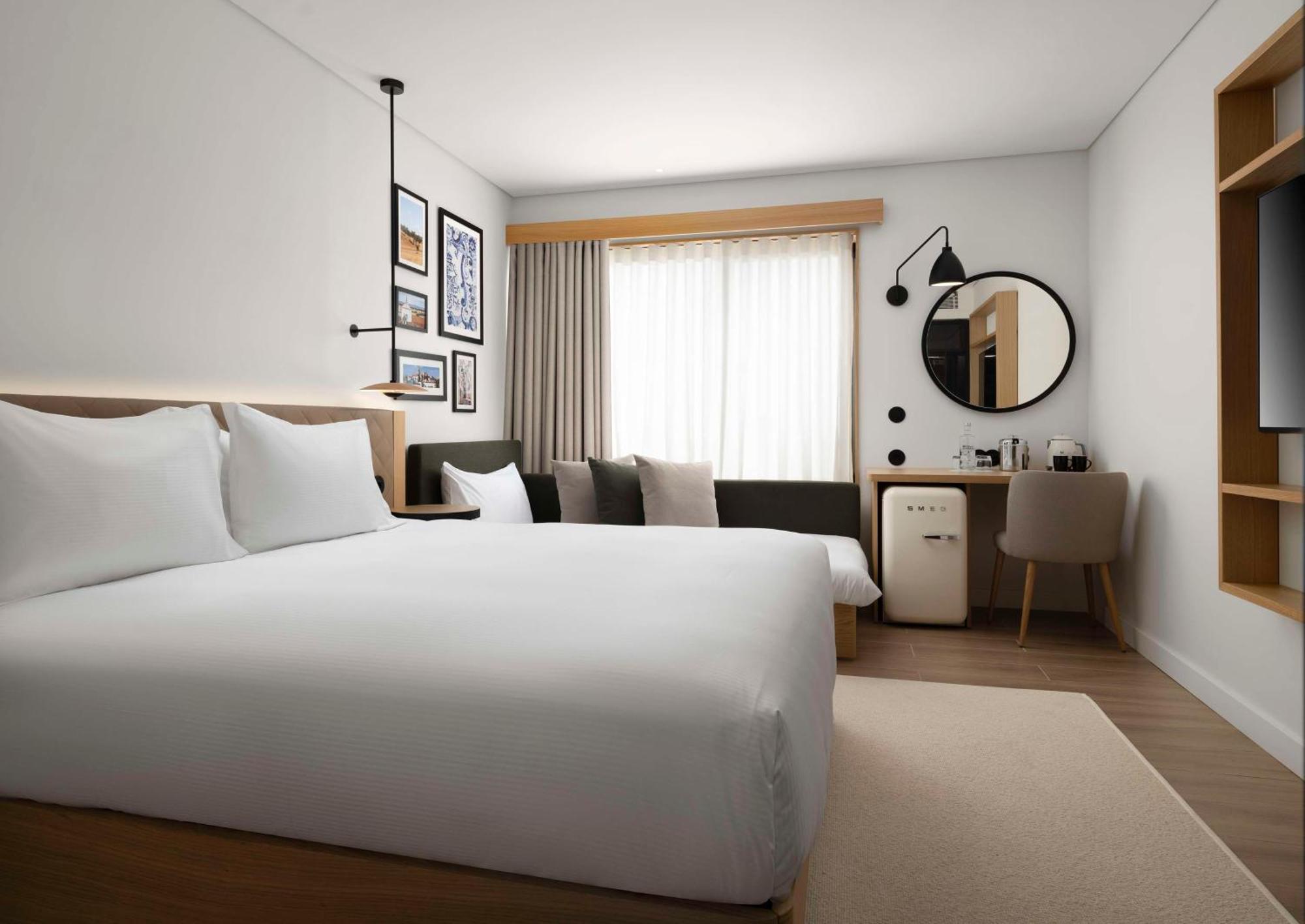Habitación Premium con cama extragrande, vistas panorámicas y sofá cama