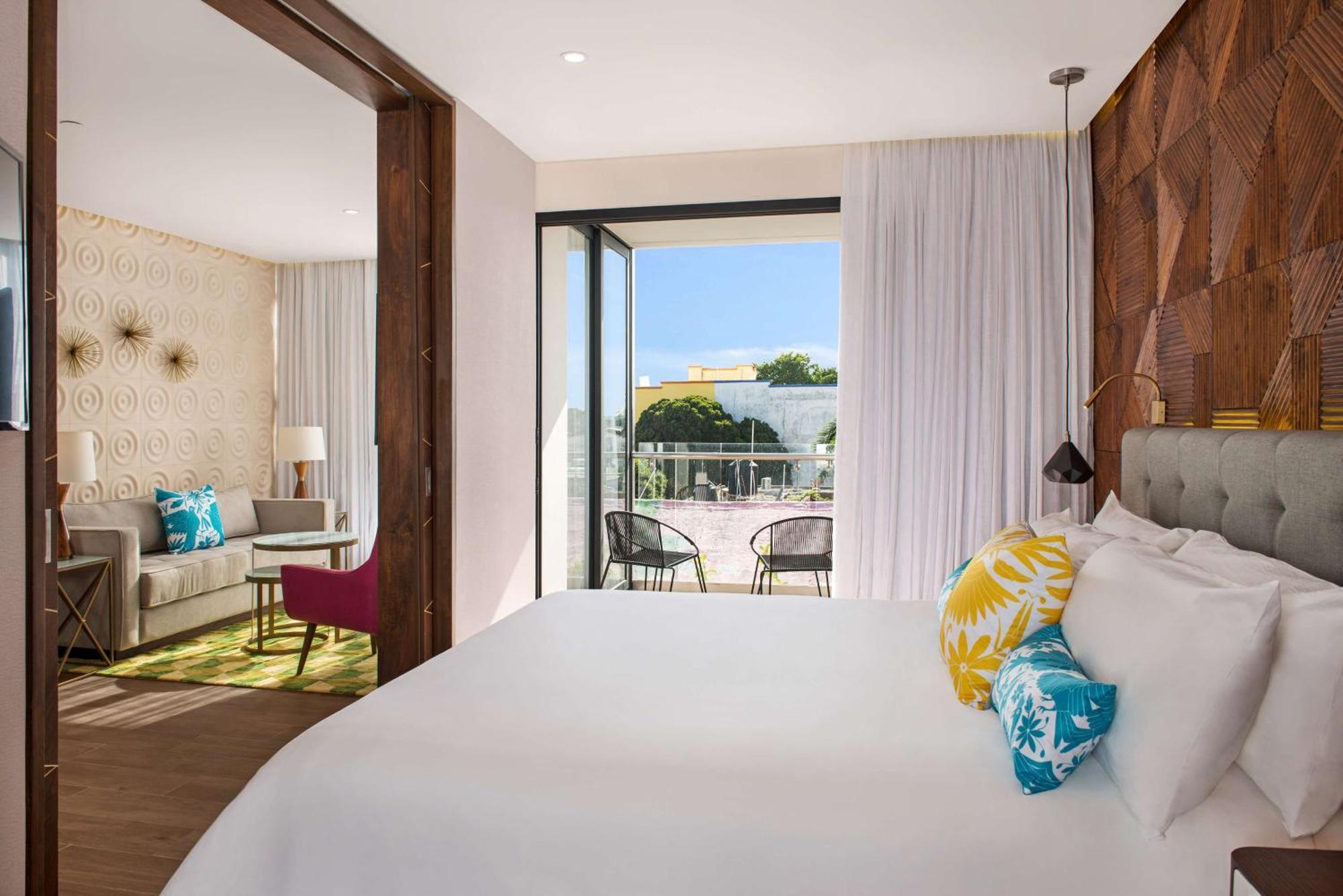Suite de 1 dormitorio con terraza y cama extragrande