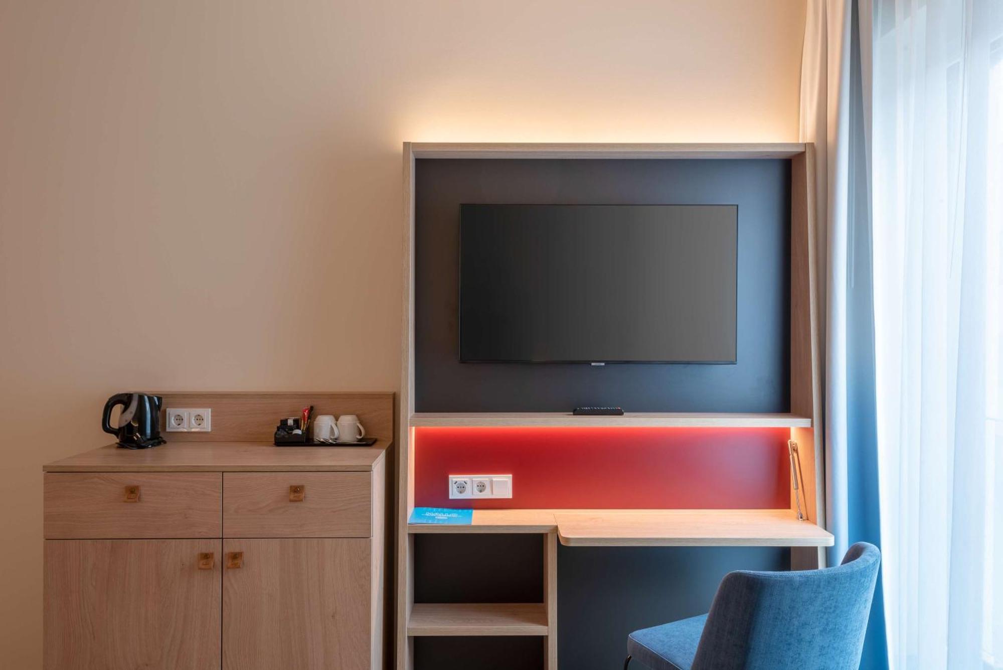 Kamer met Queensize Bed en Slaapbank