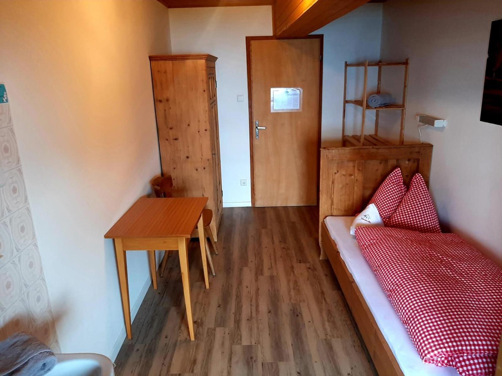 Camera Singola con Bagno in Comune