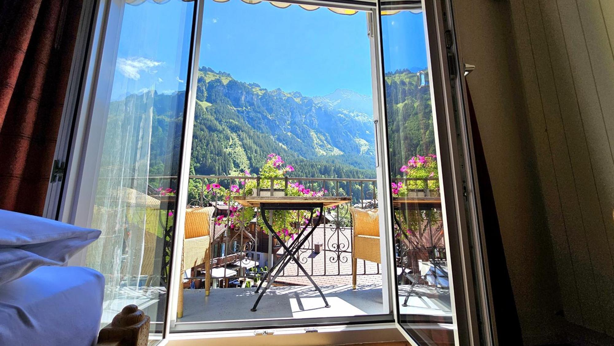 Superior Family Room Balcony Mountain View
