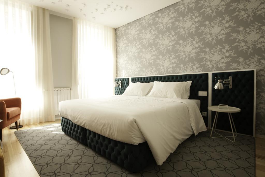 Kamer met 1 Groot Bed of 2 Aparte Bedden en Uitzicht op de Stad