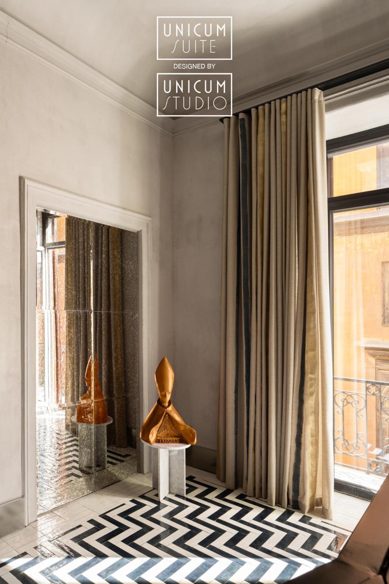 Suite Quadrupla Deluxe con Vasca da Bagno Idromassaggio e Balcone
