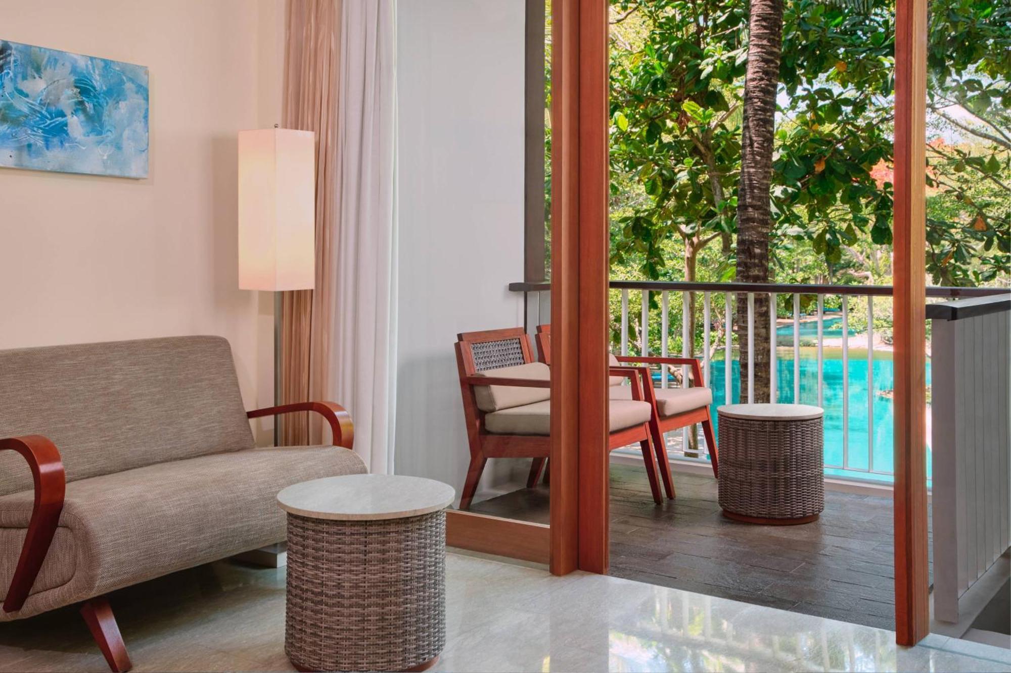 Deluxe King Room Balcony & Pool View
