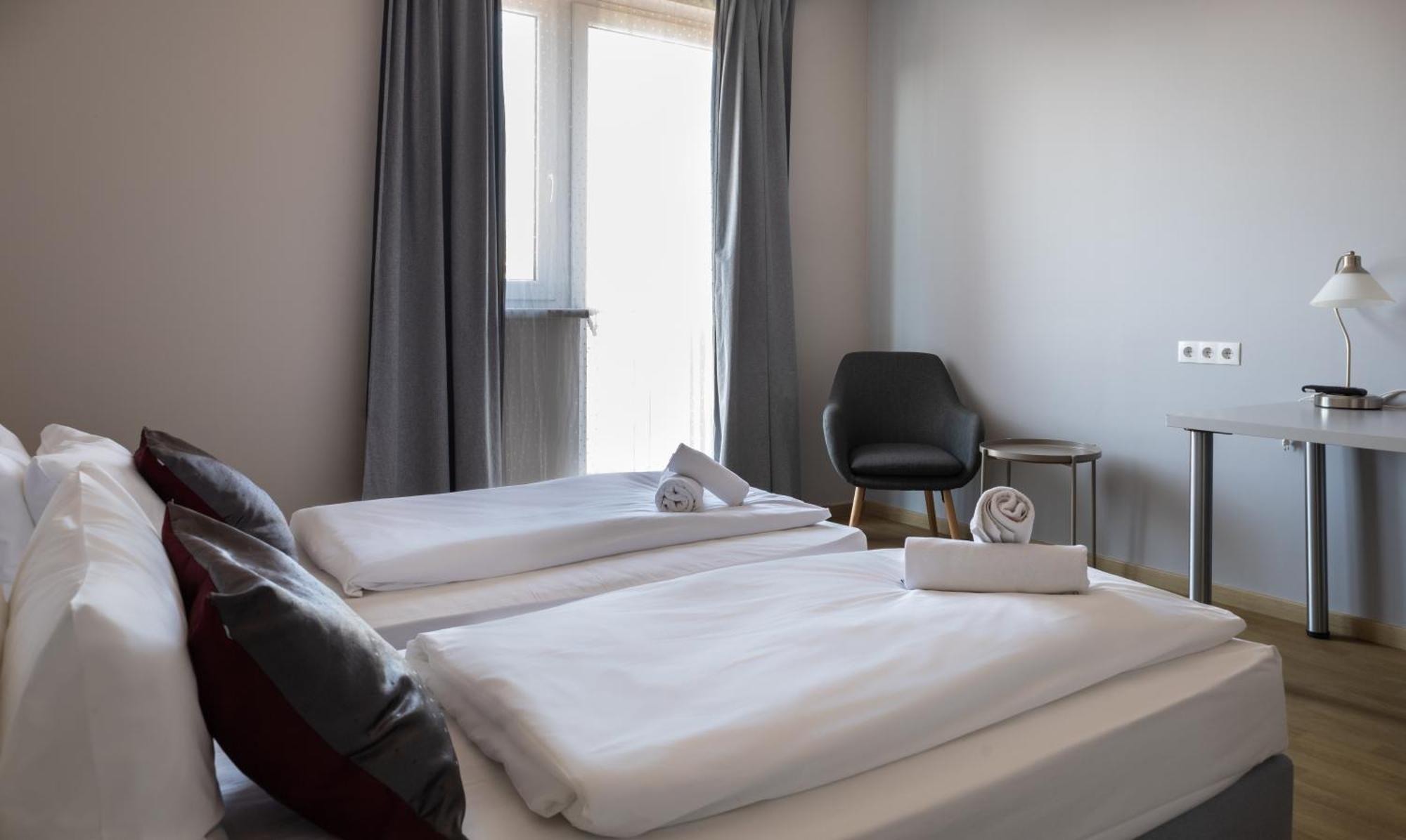 Standaard Tweepersoonskamer met 2 Aparte Bedden en een Balkon