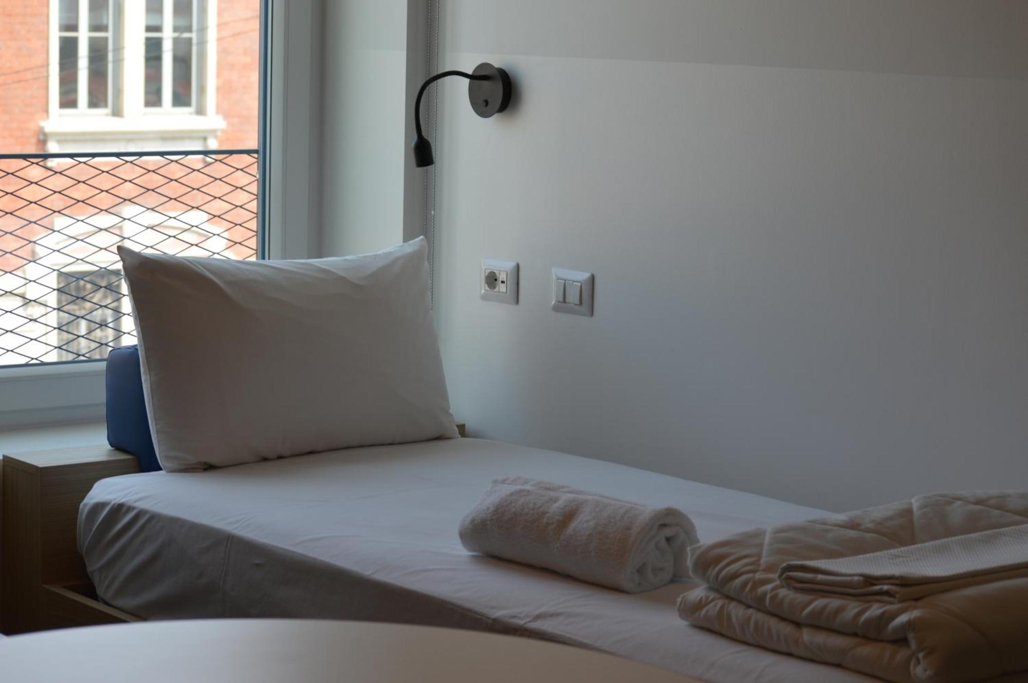 Tweepersoonskamer met 2 Aparte Bedden