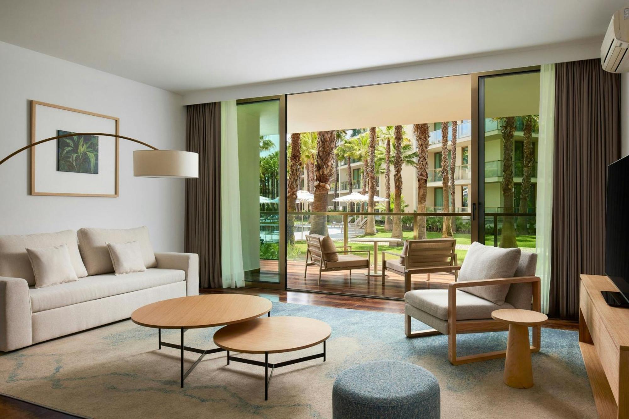 Two-Bedroom Suite Balcony Pool View