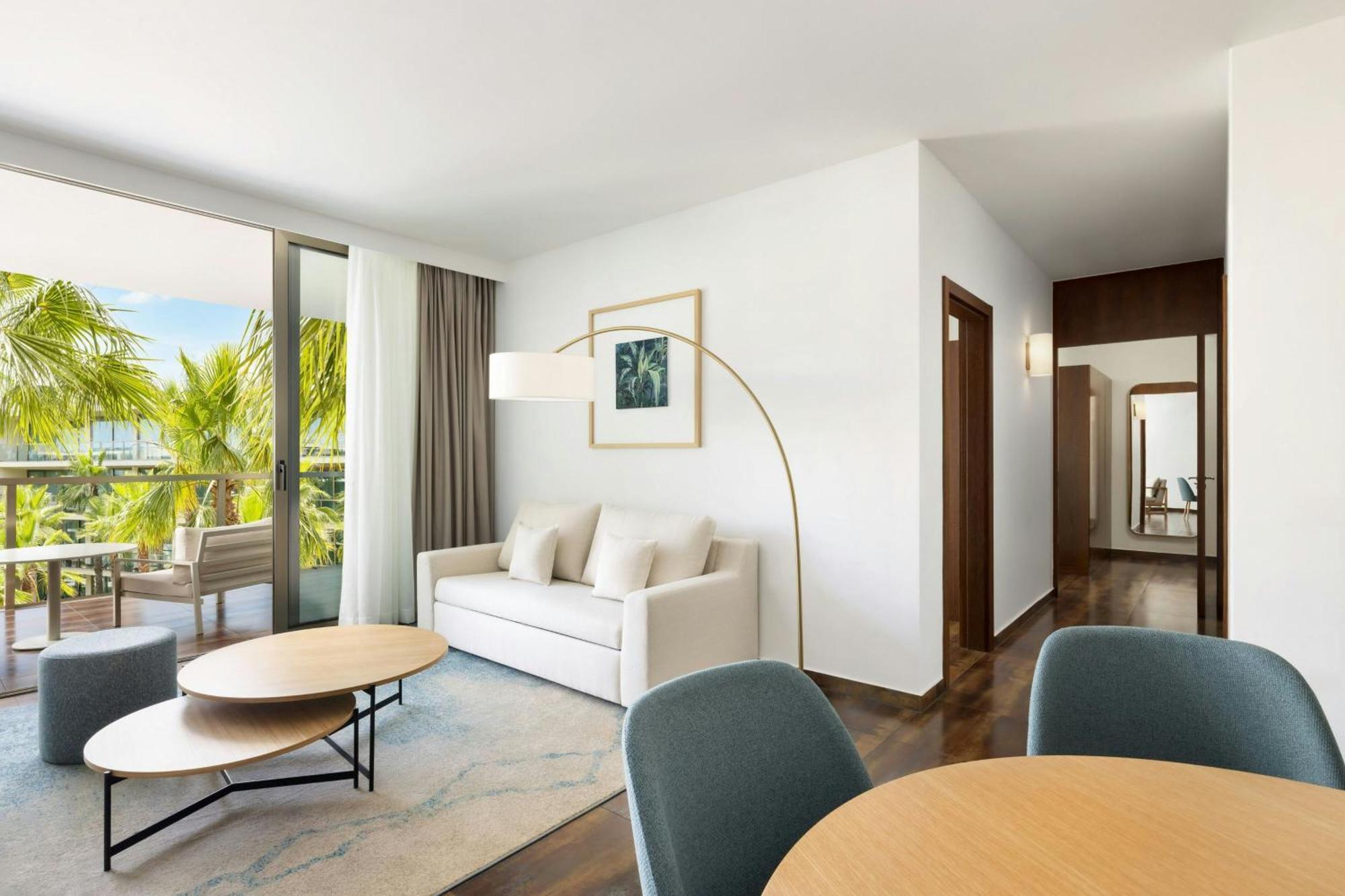 Two-Bedroom Suite Balcony Pool View