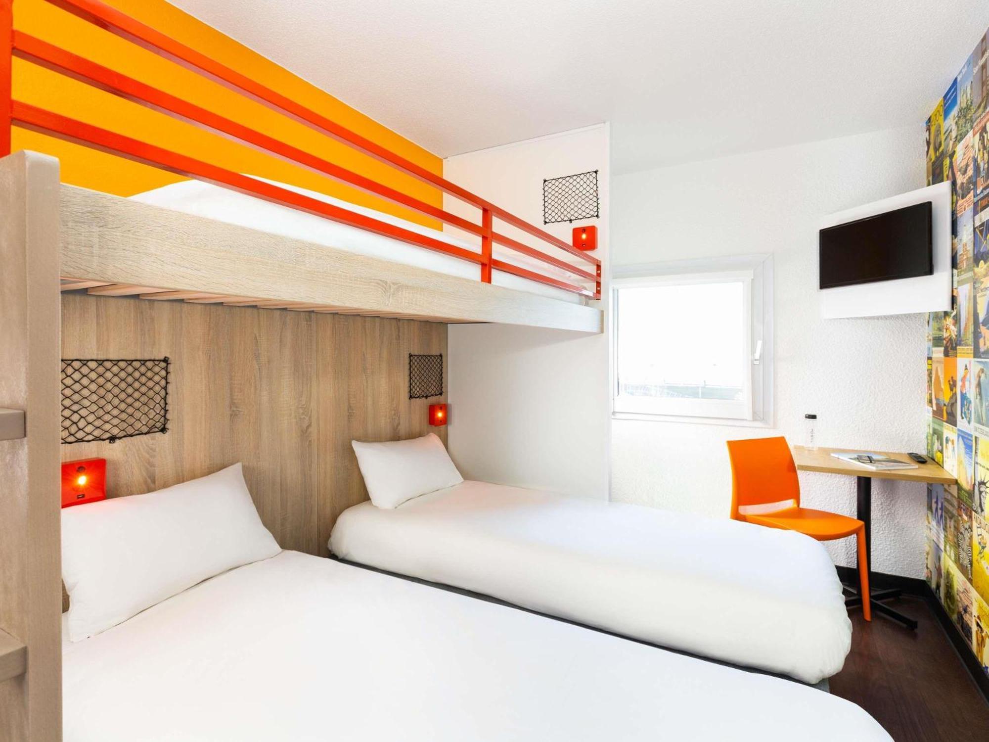 Break Room with Three Single Bunk Beds and Shared Bathroom