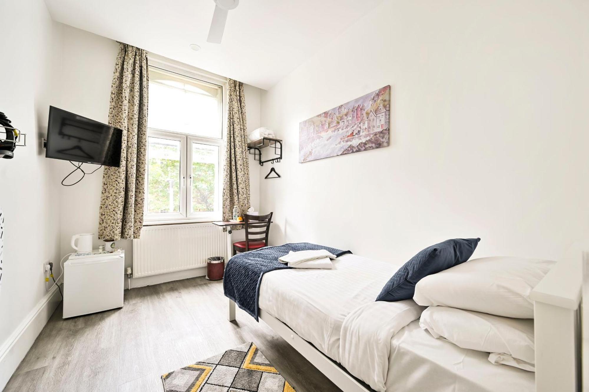 Eenpersoonskamer met Gedeelde Badkamer