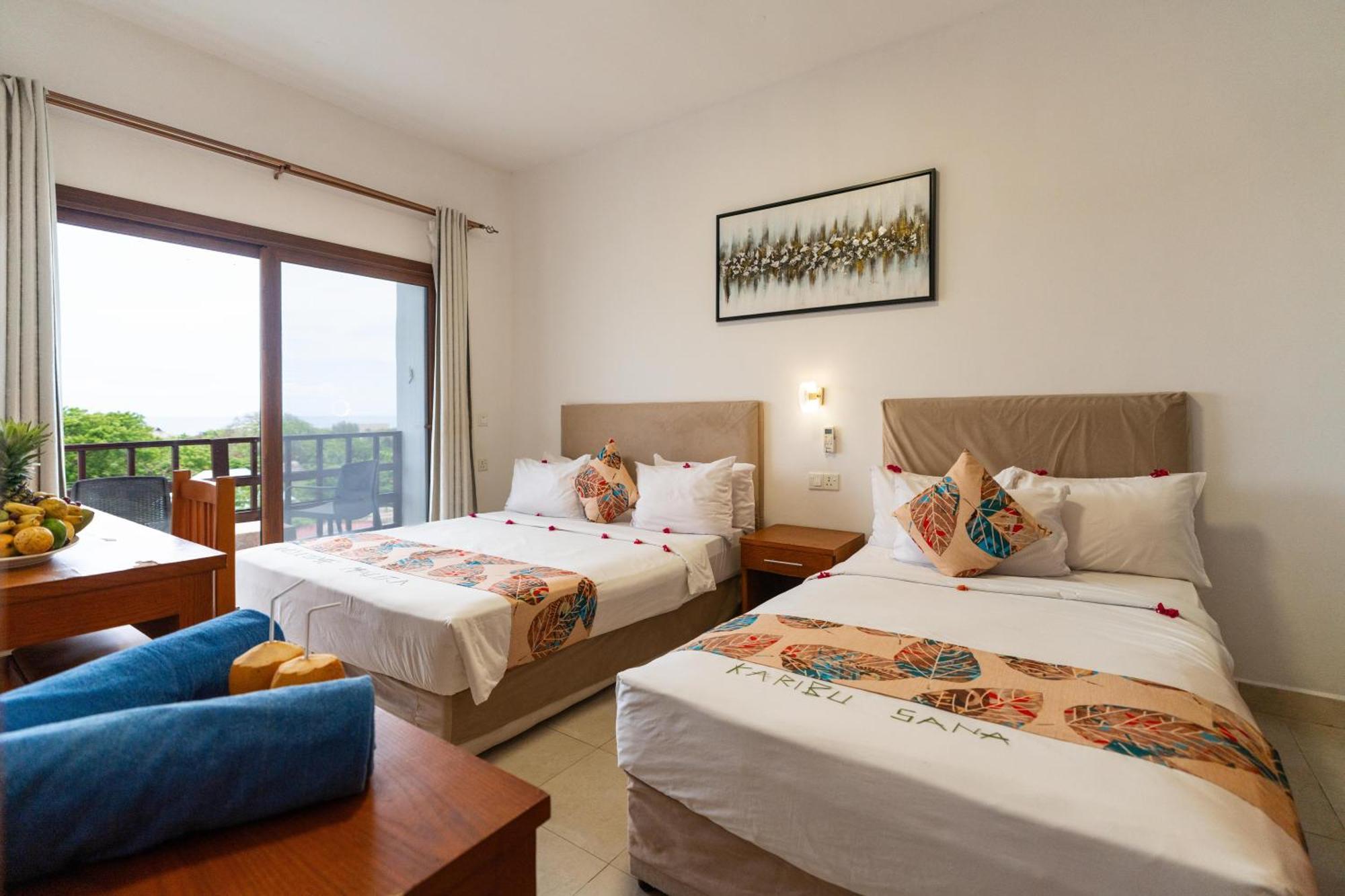 Deluxe Tweepersoonskamer met 2 Aparte Bedden en Uitzicht op Zee
