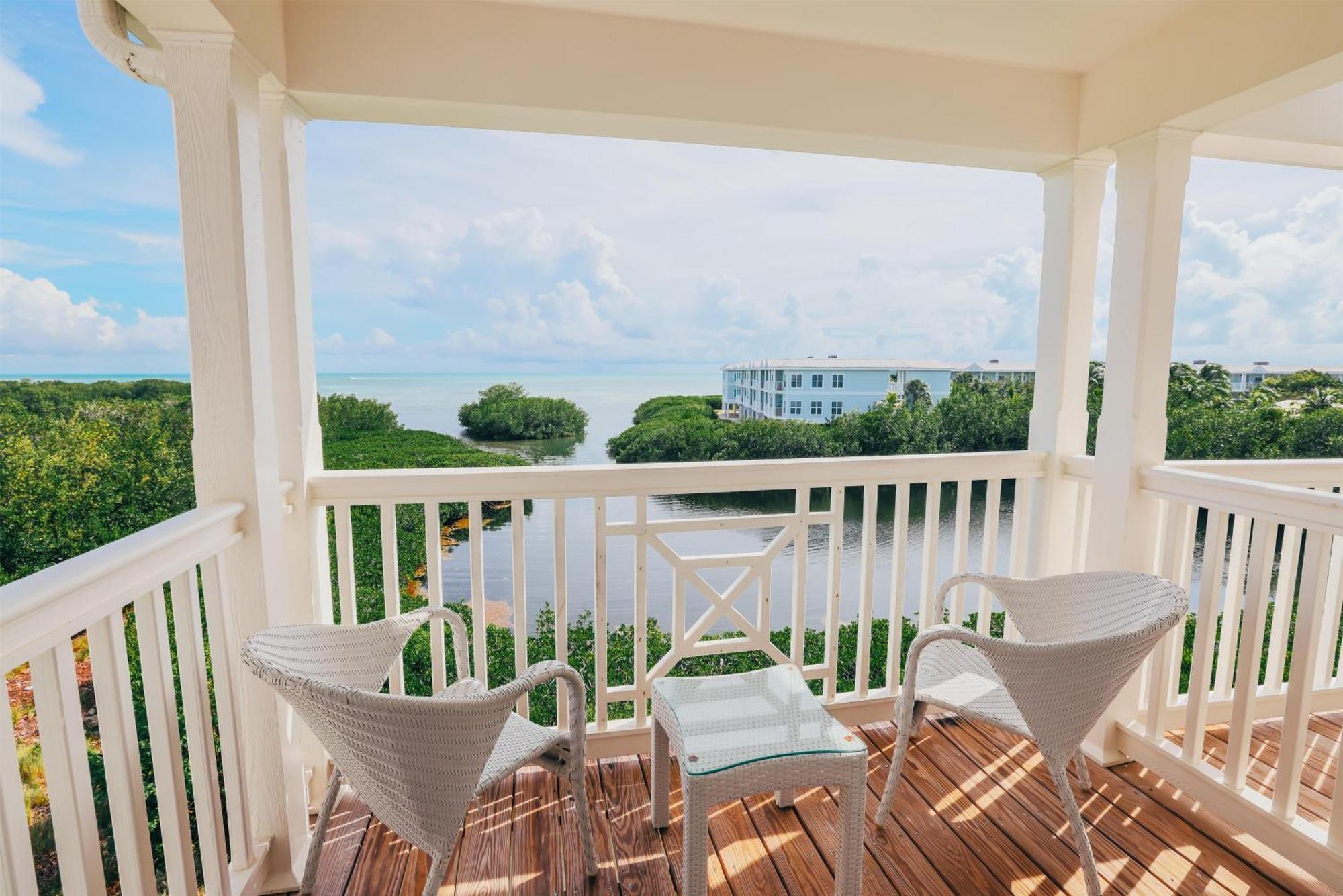 Suite with Two Queen Beds, Balcony and Partial Ocean View
