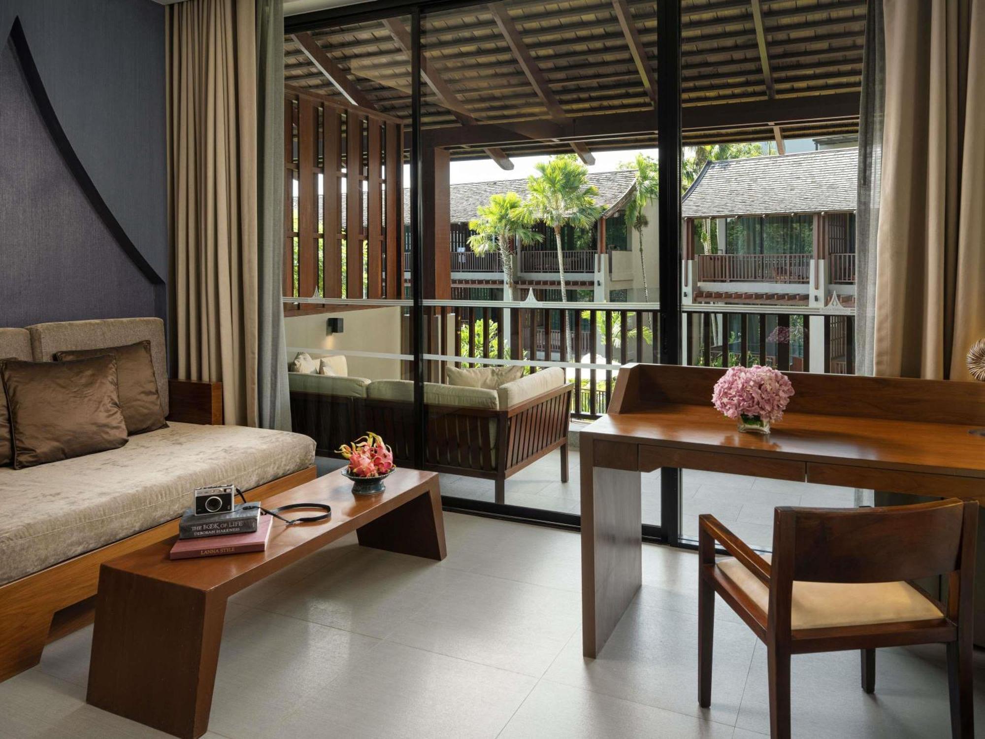 Deluxe King Room Sofa Bed Pool View