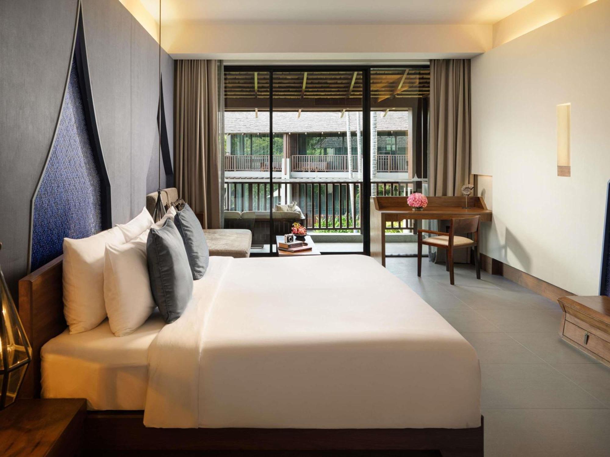 Deluxe King Room Sofa Bed Pool View