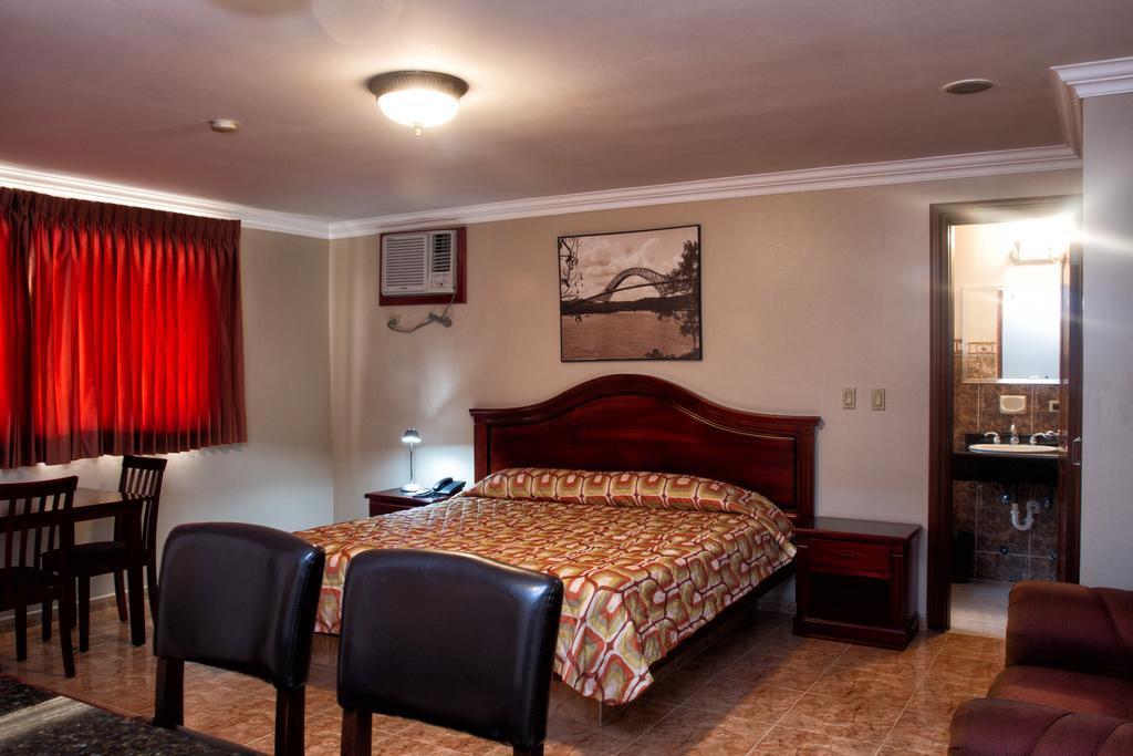 Suite con cama extragrande
