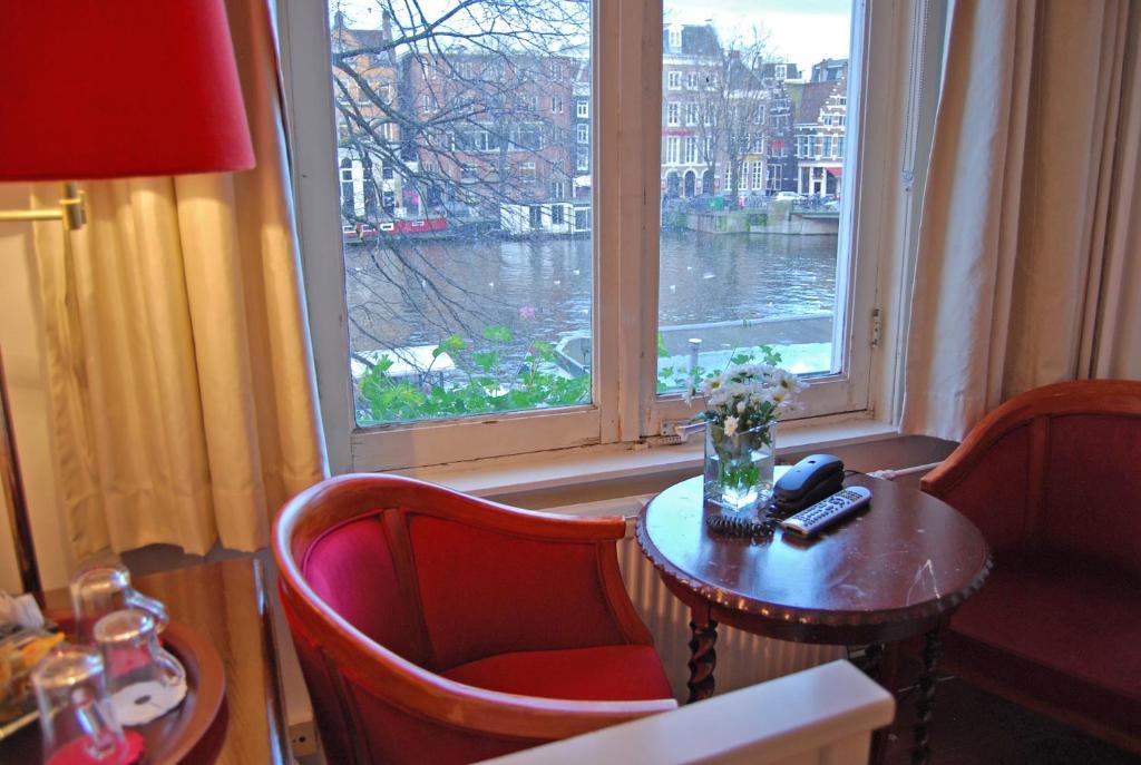 Driepersoonskamer met Uitzicht op de Gracht