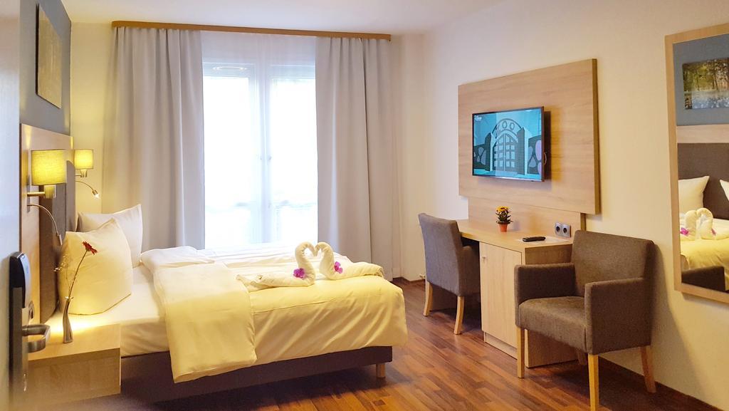 Habitación con cama extragrande y ducha a ras de suelo - Adaptada para personas con movilidad reducida