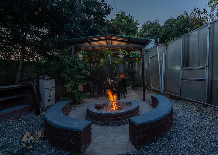 Villa: Saffronstays Timber Crest - 2-Cottage Retreat In Dehradun With Mountain Views, Lawn And Fire Pit