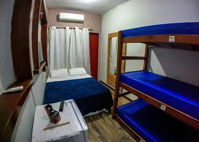 Suites e Quartos Em frente a Praia Grande -Na orla Flavia Alessandra