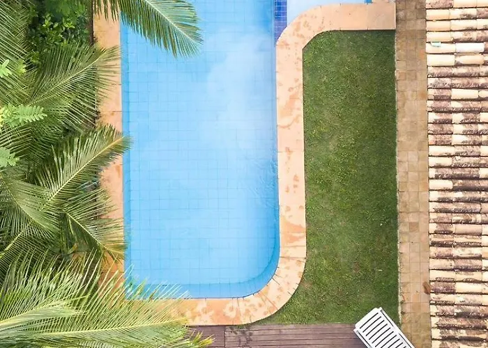 Pousada com piscina: Casa Sapoti - 5 minutos a pé da praia