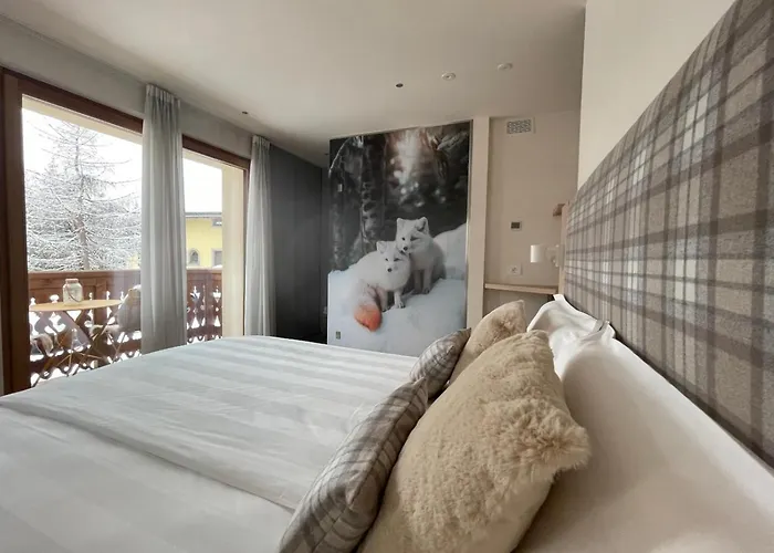 Alpine Rooms&Suites Livigno - Camana Noa -