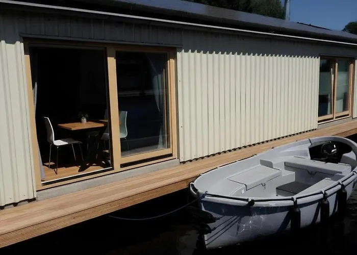 B&Boathouse With Bikes And Motorboat